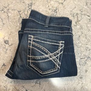 ARIAT blue jeans with white stitching